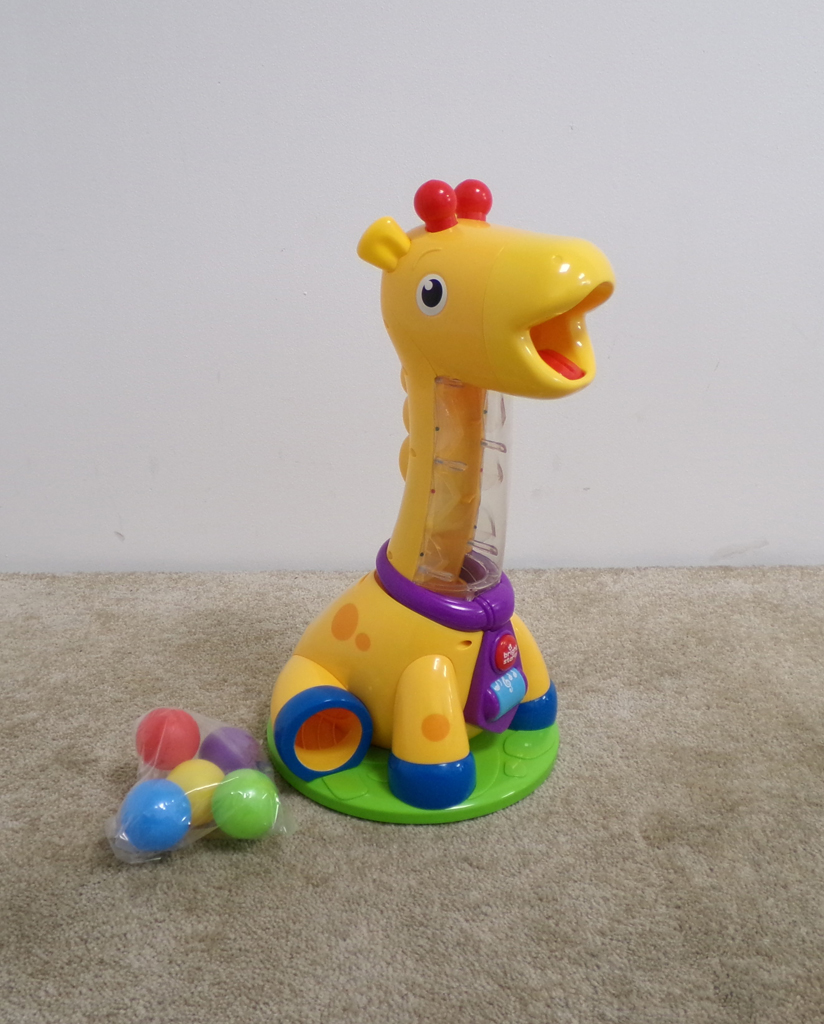 BRIGHT STARTS Hračka hudební žirafa Spin & Giggle™ 12m+